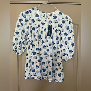 NWT boutique blouse. Loose fit. Size M